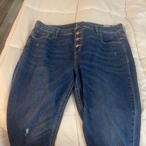 Distressed button fly jeans